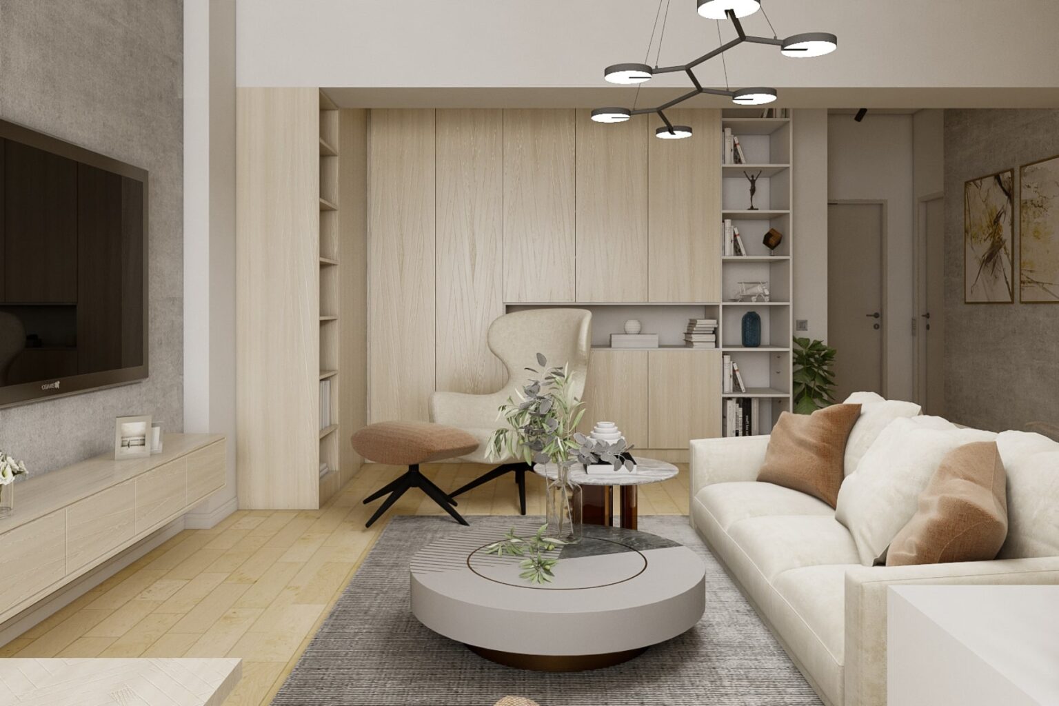 Amenajare living mare de tip open space cu o canapea mare, o masuta de cafea si un televizor LED integrat in perete.
